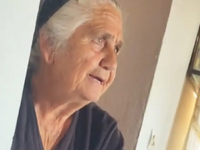 Κλασική Ελληνίδα γιαγιά προσπαθεί να σβή...