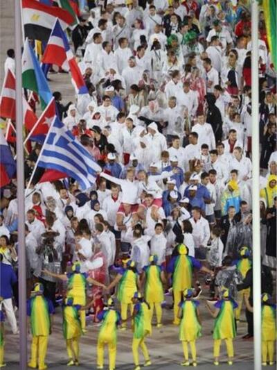 epa05506197 Athletes enter the stadium d...