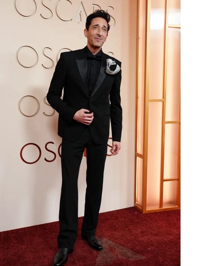 Aντριεν Μπρόντι με Gucci