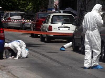 ΠΥΡΟΒΟΛΙΣΜΟΙ με Καλάσνικοφ στα γραφεία τ...