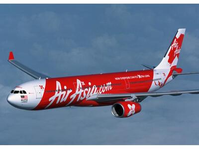 Αεροσκάφος της AirAsia επέστρεψε στη Μπα...