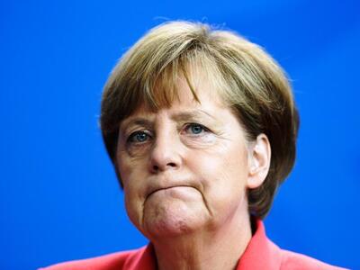 Ακτιβιστές διέκοψαν την Μέρκελ φωνάζοντα...