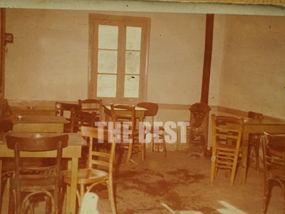 Το παλιό μαγαζί με την ξυλόσομπα και τα ...