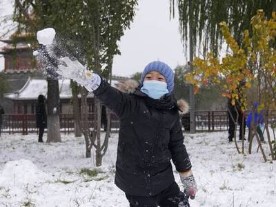 Κίνα: Βροχές και χιόνια στο Πεκίνο