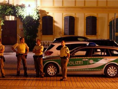 Police secure the downtown area after an...