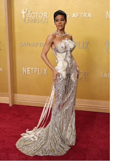 Tεγιάνα Τέιλορ με φόρεμα Τhom Browne και...