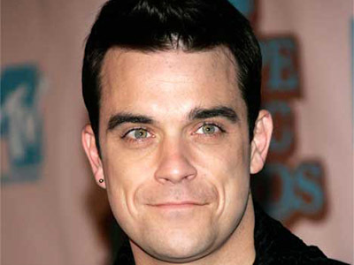 Ο Ντέμης Νικολαΐδης καλεί Robbie Williams