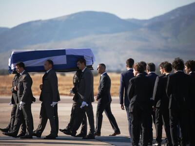 Οι φωτ. με τη σορό είναι από την Eurokinissi.