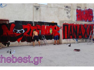 Φτιάχνοντας νέο γκράφιτι στην οδό Φιλοποίμενος